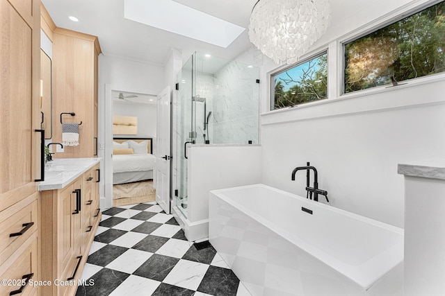 4185 Crooked Mile Rd, Merritt Island, FL 32952 - ensuite bathroom with a marble finish shower, a freestanding bath, vanity, recessed lighting, and a chandelier