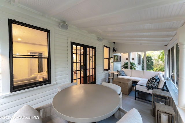 4185 Crooked Mile Rd, Merritt Island, FL 32952 - sunroom / solarium with beam ceiling, french doors, and an outdoor hangout area