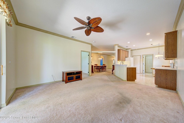 858 Morning Cove Cir SE, Palm Bay, FL 32909 - unfurnished living room with ceiling fan, light carpet, crown molding, baseboards, and recessed lighting