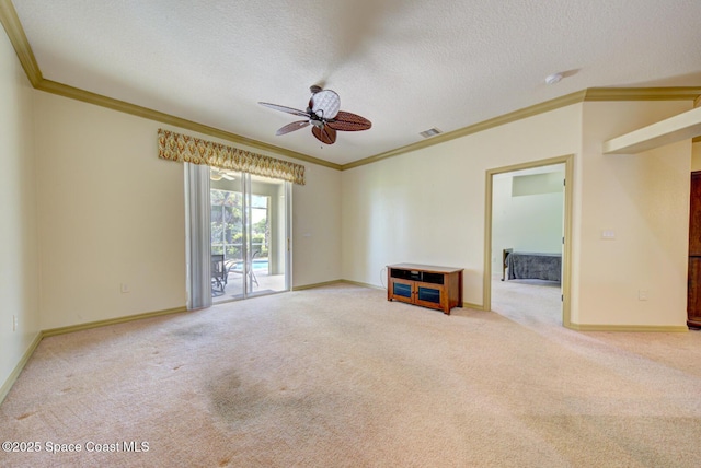858 Morning Cove Cir SE, Palm Bay, FL 32909 - spare room featuring crown molding, carpet, a ceiling fan, a textured ceiling, and baseboards