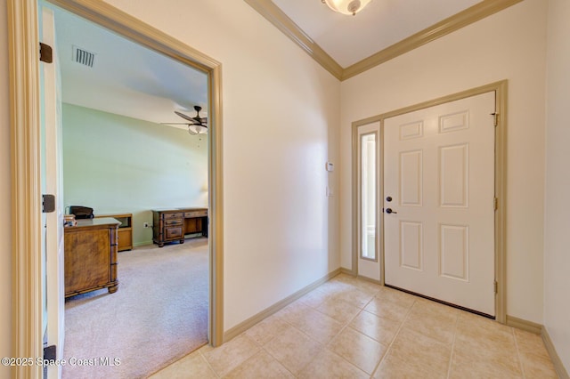 858 Morning Cove Cir SE, Palm Bay, FL 32909 - foyer featuring crown molding, ceiling fan, baseboards, and light tile patterned floors