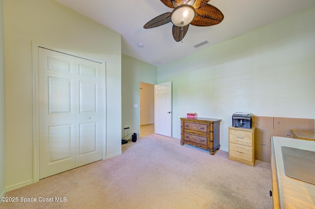 858 Morning Cove Cir SE, Palm Bay, FL 32909 - bedroom featuring carpet, a closet, a ceiling fan, and baseboards