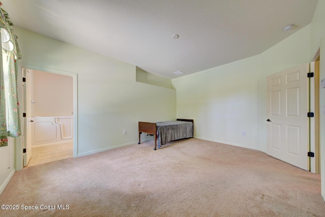 858 Morning Cove Cir SE, Palm Bay, FL 32909 - additional living space with carpet flooring and baseboards