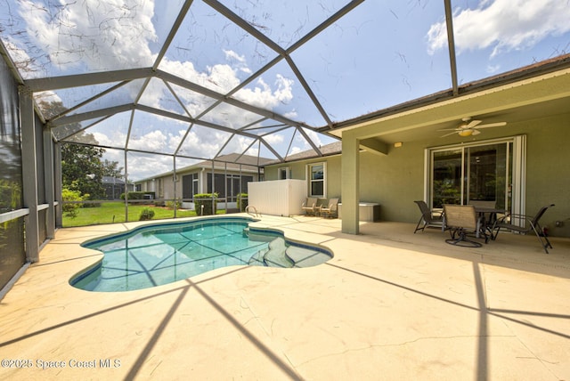858 Morning Cove Cir SE, Palm Bay, FL 32909 - swimming pool featuring a patio area, a ceiling fan, and a lanai