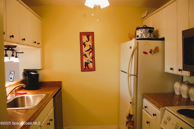2020 N Atlantic Ave Unit 508-N, Cocoa Beach, FL 32931 - kitchen featuring a sink, white cabinetry, and stainless steel appliances