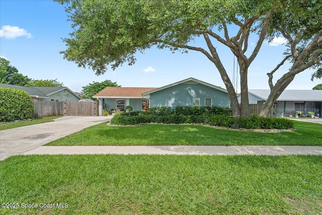 609 Tallwood Cir, Melbourne, FL 32904 - single story home with driveway and stucco siding