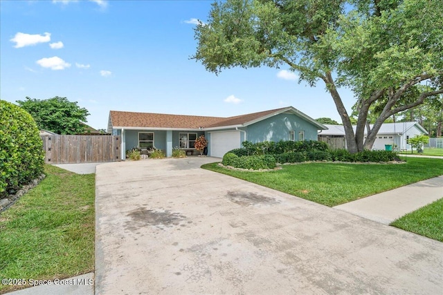 609 Tallwood Cir, Melbourne, FL 32904 - single story home featuring driveway, an attached garage, and stucco siding