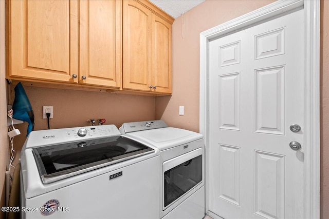609 Tallwood Cir, Melbourne, FL 32904 - laundry room featuring washer and clothes dryer and cabinet space