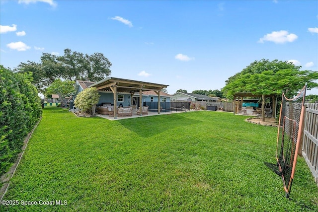 609 Tallwood Cir, Melbourne, FL 32904 - view of yard with a patio and outdoor lounge area