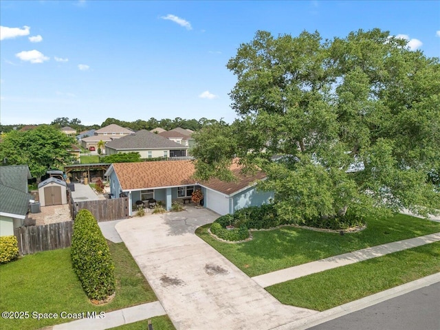 609 Tallwood Cir, Melbourne, FL 32904 - view of front of house with driveway and a garage
