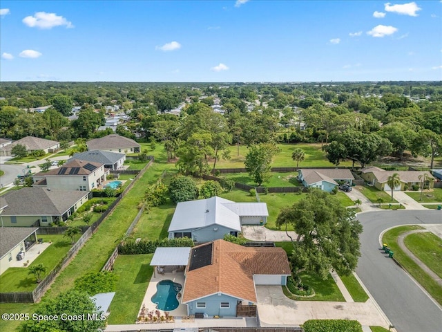 609 Tallwood Cir, Melbourne, FL 32904 - aerial perspective of suburban area featuring a pool area and a tree filled landscape