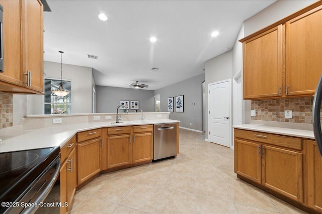 2465 Tuscarora Ct, Melbourne, FL 32904 - kitchen with stainless steel dishwasher, black electric range oven, a sink, backsplash, and a peninsula