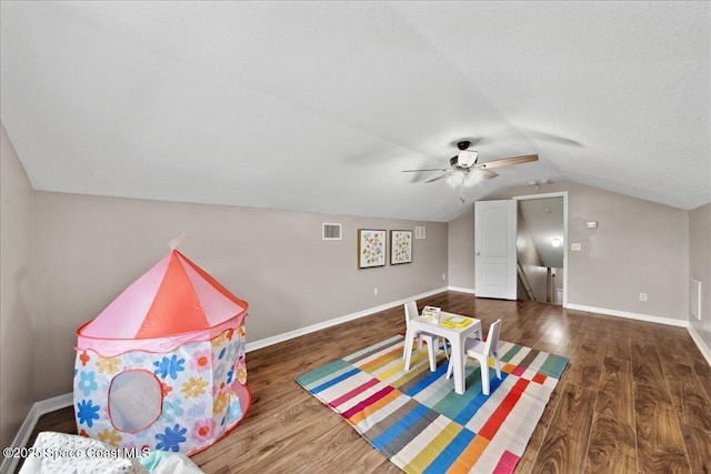 2465 Tuscarora Ct, Melbourne, FL 32904 - recreation room with vaulted ceiling, wood finished floors, and baseboards