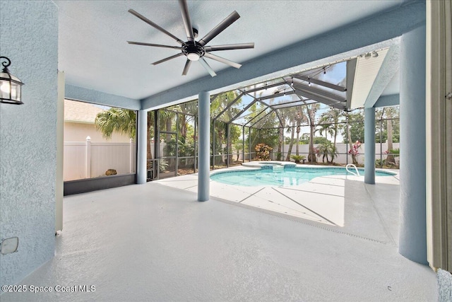 2465 Tuscarora Ct, Melbourne, FL 32904 - view of pool with a ceiling fan, a patio area, a pool with connected hot tub, and glass enclosure