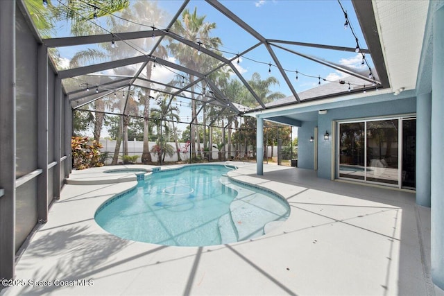 2465 Tuscarora Ct, Melbourne, FL 32904 - view of pool with a patio area, a pool with connected hot tub, and a lanai