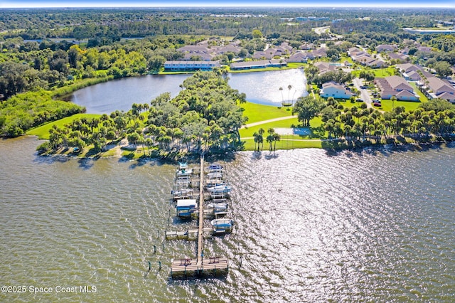 109 Plover Ln Unit 4-35, Rockledge, FL 32955 - aerial perspective of suburban area with a large body of water