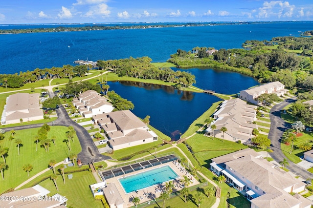 109 Plover Ln Unit 4-35, Rockledge, FL 32955 - aerial perspective of suburban area with a large body of water and a pool