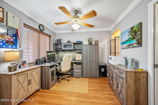 109 Plover Ln Unit 4-35, Rockledge, FL 32955 - home office with crown molding, light wood-type flooring, and a ceiling fan
