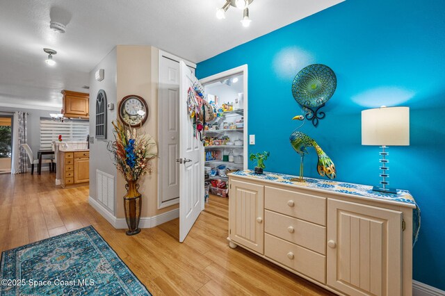 109 Plover Ln Unit 4-35, Rockledge, FL 32955 - bedroom featuring light wood finished floors and baseboards