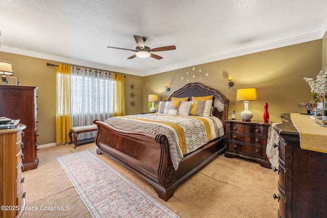 109 Plover Ln Unit 4-35, Rockledge, FL 32955 - bedroom featuring light colored carpet, crown molding, a textured ceiling, ceiling fan, and baseboards