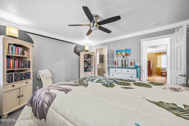 109 Plover Ln Unit 4-35, Rockledge, FL 32955 - bedroom featuring crown molding, ensuite bath, a ceiling fan, a textured ceiling, and carpet