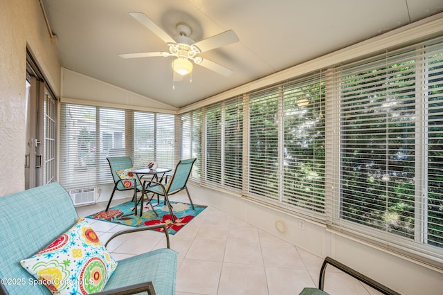 109 Plover Ln Unit 4-35, Rockledge, FL 32955 - sunroom / solarium featuring a ceiling fan, lofted ceiling, tile patterned floors, and a wall unit AC