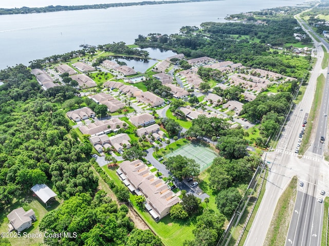 109 Plover Ln Unit 4-35, Rockledge, FL 32955 - aerial perspective of suburban area featuring a highway and a nearby body of water