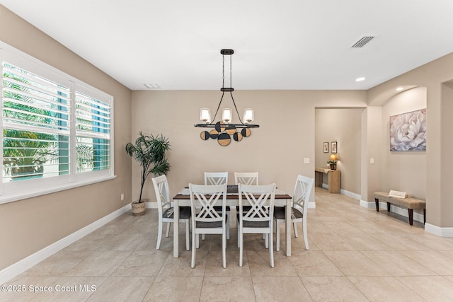 3387 Caviston Way, Melbourne, FL 32940 - dining room with a chandelier, light tile patterned floors, baseboards, and recessed lighting