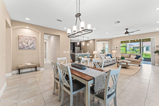3387 Caviston Way, Melbourne, FL 32940 - dining space featuring light tile patterned floors, baseboards, a chandelier, recessed lighting, and ceiling fan