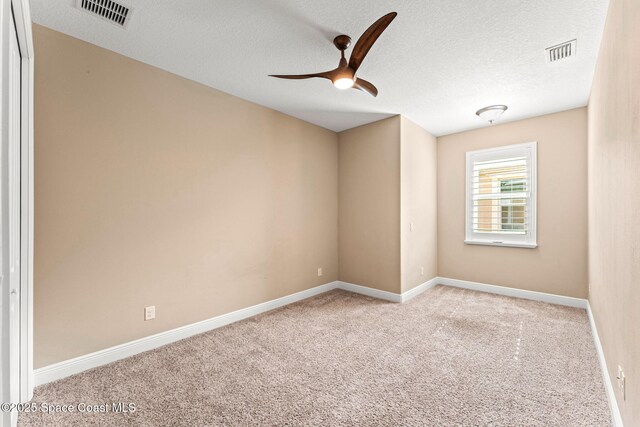 3387 Caviston Way, Melbourne, FL 32940 - carpeted spare room with a ceiling fan, baseboards, and a textured ceiling