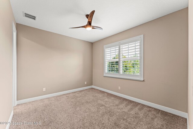 3387 Caviston Way, Melbourne, FL 32940 - unfurnished room with a ceiling fan, carpet flooring, and baseboards