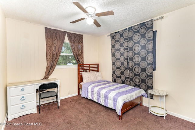 2109 Ivy Dr, Cocoa, FL 32922 - bedroom with carpet floors, a textured ceiling, ceiling fan, and baseboards