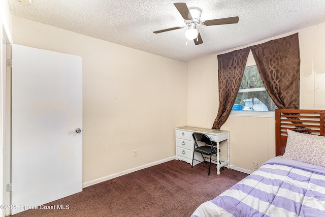 2109 Ivy Dr, Cocoa, FL 32922 - bedroom with carpet floors, a textured ceiling, baseboards, and ceiling fan