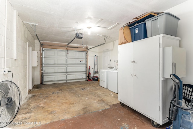 2109 Ivy Dr, Cocoa, FL 32922 - garage with a garage door opener, separate washer and dryer, and concrete block wall