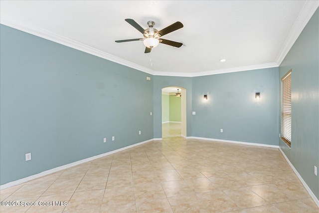 4843 Erin Ln, Melbourne, FL 32940 - tiled spare room with arched walkways, a ceiling fan, ornamental molding, baseboards, and recessed lighting