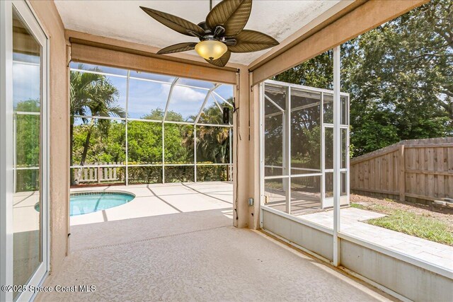 4843 Erin Ln, Melbourne, FL 32940 - unfurnished sunroom featuring a ceiling fan