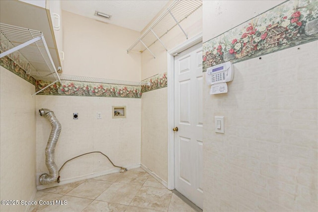 4843 Erin Ln, Melbourne, FL 32940 - washroom with washer hookup, electric dryer hookup, and tile patterned floors