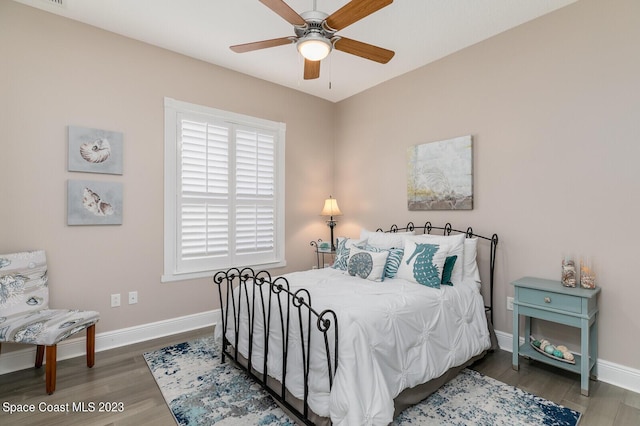 5145 Limousin Ct, Rockledge, FL 32955 - bedroom featuring wood finished floors, baseboards, and ceiling fan