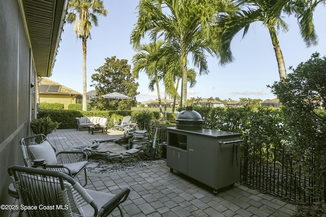 5145 Limousin Ct, Rockledge, FL 32955 - view of patio featuring outdoor lounge area and an outdoor kitchen