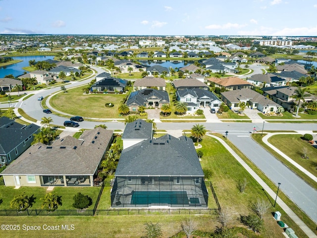 7690 Kerrington Dr, Melbourne, FL 32940 - aerial perspective of suburban area featuring a large body of water