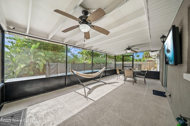 1941 Dawn Dr, Melbourne, FL 32935 - sunroom / solarium with outdoor dining space, ceiling fan, and beamed ceiling