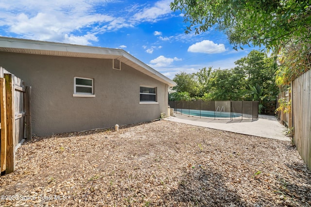 1941 Dawn Dr, Melbourne, FL 32935 - fenced backyard featuring a patio