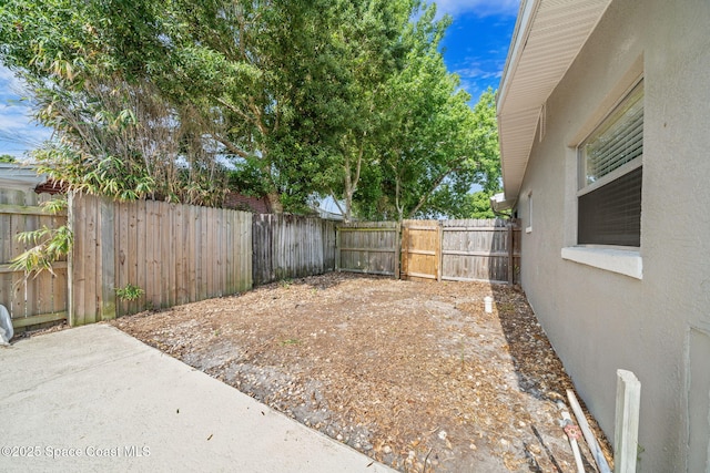 1941 Dawn Dr, Melbourne, FL 32935 - fenced backyard featuring a patio