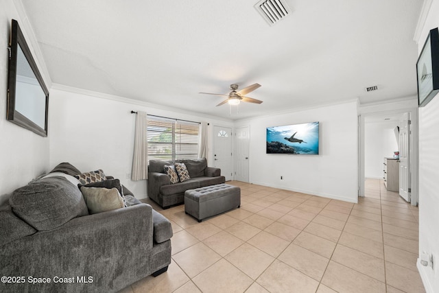 1941 Dawn Dr, Melbourne, FL 32935 - living room with light tile patterned flooring, a ceiling fan, crown molding, and baseboards