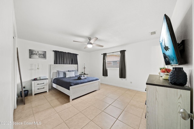 1941 Dawn Dr, Melbourne, FL 32935 - bedroom featuring light tile patterned flooring, baseboards, and a ceiling fan