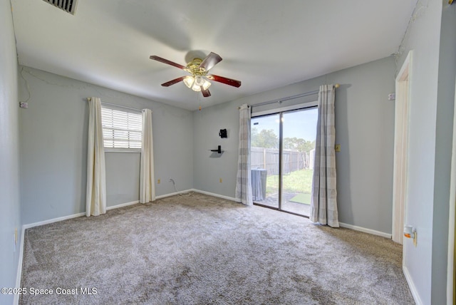 581 Howe Ave SE, Palm Bay, FL 32909 - carpeted empty room featuring a ceiling fan and baseboards