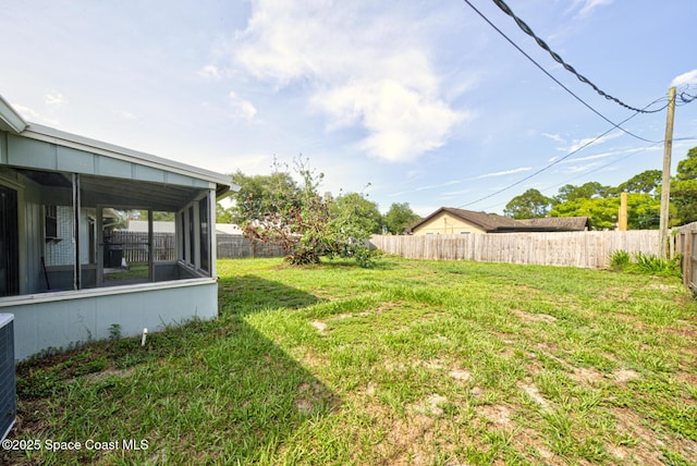 581 Howe Ave SE, Palm Bay, FL 32909 - view of yard featuring a sunroom