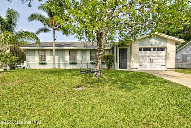 581 Howe Ave SE, Palm Bay, FL 32909 - ranch-style home featuring driveway, a garage, and a front lawn