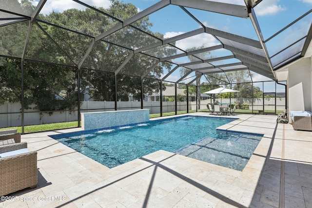 1025 Aranceto Cir, Merritt Island, FL 32952 - view of pool with a patio area, a fenced backyard, and glass enclosure