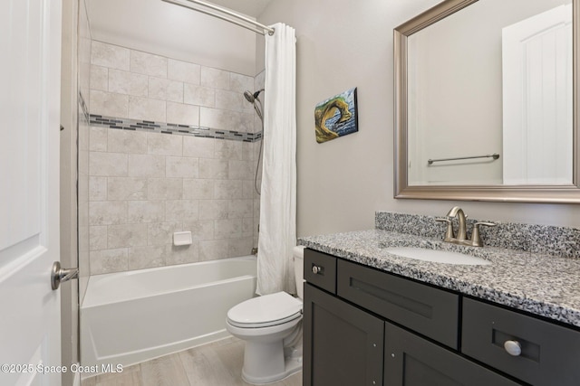 1025 Aranceto Cir, Merritt Island, FL 32952 - bathroom featuring vanity, shower / bath combination with curtain, and wood finished floors